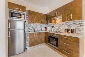 Kuchyň nebo kuchyňský kout v ubytování Diamond Family Suite Heated Pool + 11 fotografií