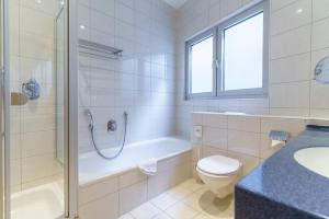 Koupelna v ubytování Stadthotel Pfeffermühle