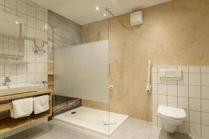 Koupelna v ubytování Stadthotel Pfeffermühle + 16 fotografií