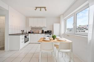 Kuchyň nebo kuchyňský kout v ubytování RH01 Apartment in Bensheim