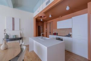 Kuchyň nebo kuchyňský kout v ubytování Appartement Belle lettre 4