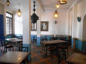ห้องอาหารหรือที่รับประทานอาหารของ Hôtel Central