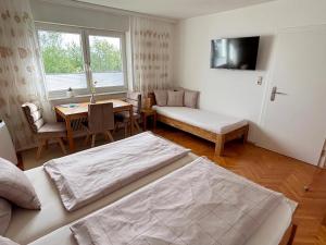 Postel nebo postele na pokoji v ubytování Ferienzimmer Trummer