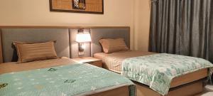 Bloom Home Stay客房内的一张或多张床位
