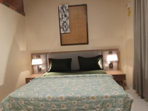 Bloom Home Stay客房内的一张或多张床位