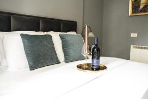 Postel nebo postele na pokoji v ubytování Hotel Dum by Muskat