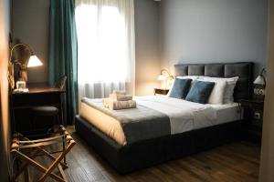 Postel nebo postele na pokoji v ubytování Hotel Dum by Muskat