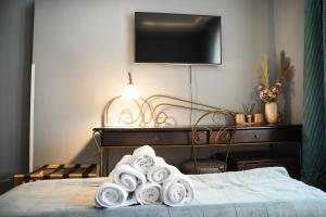 Postel nebo postele na pokoji v ubytování Hotel Dum by Muskat