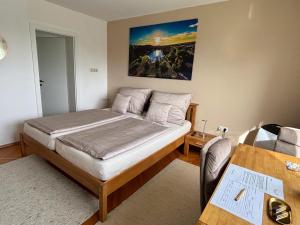 Letto o letti in una camera di Ferienzimmer Trummer