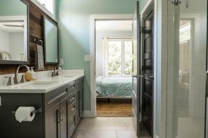 a bathroom with a sink and a shower at Reynolds View in Asheville +126 photos