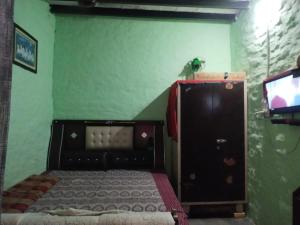 TV a/nebo společenská místnost v ubytování Rajesh homestay