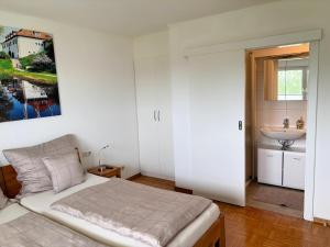 Letto o letti in una camera di Ferienzimmer Trummer