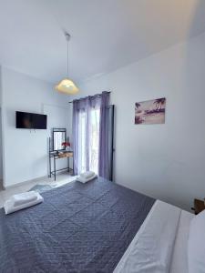 Una cama o camas en una habitación de Calypso Heaven
