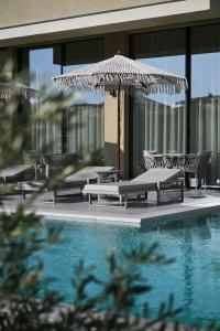 Bazén v ubytování Asters Hotel nebo v jeho okolí
