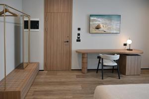 Postel nebo postele na pokoji v ubytování Asters Hotel