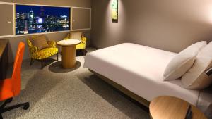 Postel nebo postele na pokoji v ubytování ANA Crowne Plaza Niigata by IHG + 37 fotografií