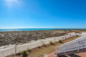an aerial view of the beach and the ocean at Beach Baby by Gulf Coast Getaways in Navarre