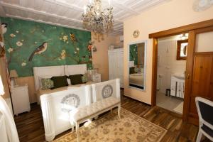 A bed or beds in a room at Vidéki Porta