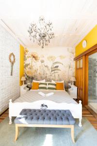 A bed or beds in a room at Vidéki Porta
