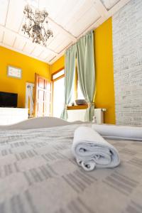 A bed or beds in a room at Vidéki Porta