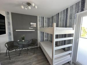 Postel nebo postele na pokoji v ubytování Kleine Möwe
