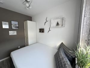 Postel nebo postele na pokoji v ubytování Kleine Möwe