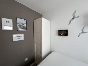 Postel nebo postele na pokoji v ubytování Kleine Möwe