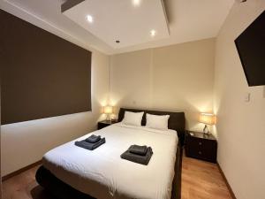 Postel nebo postele na pokoji v ubytování STAY Mesa Luxe Apartment