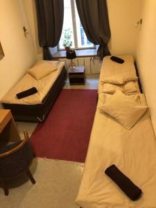 Postel nebo postele na pokoji v ubytování Hostel4You