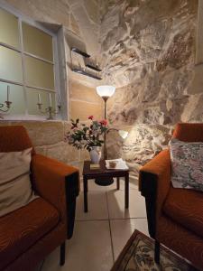 Istumisnurk majutusasutuses Charming rustic getaway in Xaghra, Gozo.