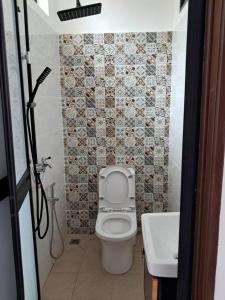 Et badeværelse på Anggun Homestay + 1 billede