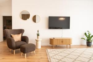 TV a/nebo společenská místnost v ubytování ONL Apartments