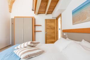 Letto o letti in una camera di La Corte Relais