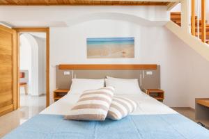 Postel nebo postele na pokoji v ubytování La Corte Relais + 19 fotografií
