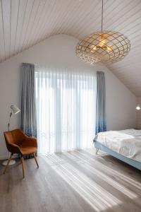 Ένα ή περισσότερα κρεβάτια σε δωμάτιο στο Ferienhaus Neukamp 17B Fischerhütte