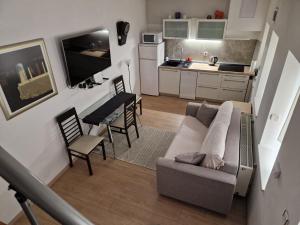 Kuchyňa alebo kuchynka v ubytovaní Studio Sweet Home