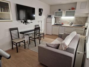 Kuchyňa alebo kuchynka v ubytovaní Studio Sweet Home