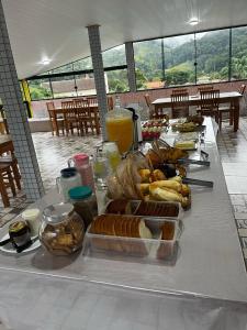 a table with bread and other food on it at Hotel Lumiar in Lumiar +83 photos