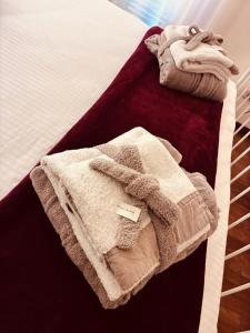 A bed or beds in a room at Maison de Maff