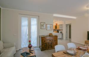 a living room with a couch and a table at 3 Bedroom Nice Home In Ripa in Vallecchia