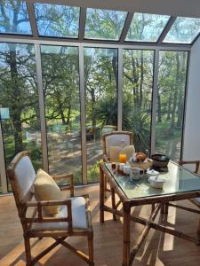 Κήπος έξω από το L'orée du bois aux portes de Montauban