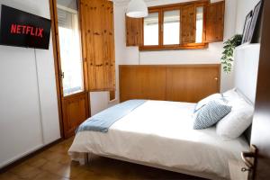 Ένα ή περισσότερα κρεβάτια σε δωμάτιο στο Sabbia & Pinoli - Tirrenia, Pisa