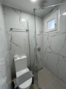 Ванная комната в Sunset view Rooms