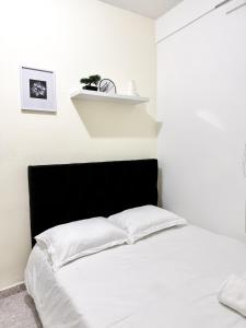 Ένα ή περισσότερα κρεβάτια σε δωμάτιο στο Habitación doble con entrada independiente y baño privado