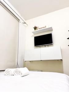 Ένα ή περισσότερα κρεβάτια σε δωμάτιο στο Habitación doble con entrada independiente y baño privado