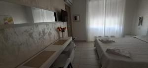 Voodi või voodid majutusasutuse B&B Alpolt toas