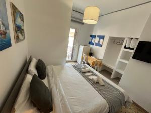 Кровать или кровати в номере Sunset view Rooms