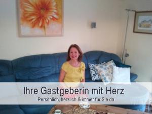 Ruang duduk di Fewos-Bremerhaven, Ferienwohnung "Lilie" in Geestland-Langen, ideal für Familien & Homeoffice - WLAN & kostenlose Fahrräder - 3 Zimmer, Balkon - nahe Bremerhaven