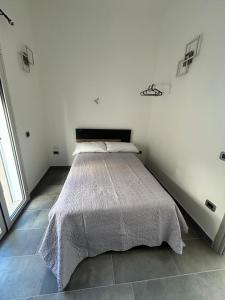 Letto o letti in una camera di Punta mare