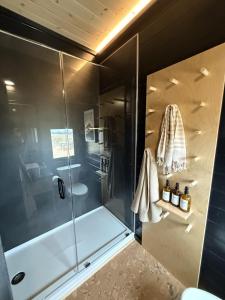 a bathroom with a shower and a sink at The Retreat on the Ranch (INSANE VIEW) in Gap +17 photos